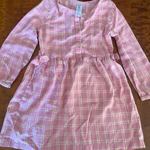 Carter’s brand dress size 5T. Used in great condition.